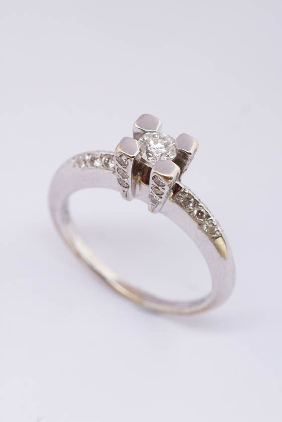 18 carat white gold ring with diamonds