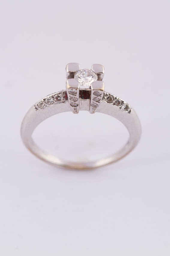 18 carat white gold ring with diamonds
