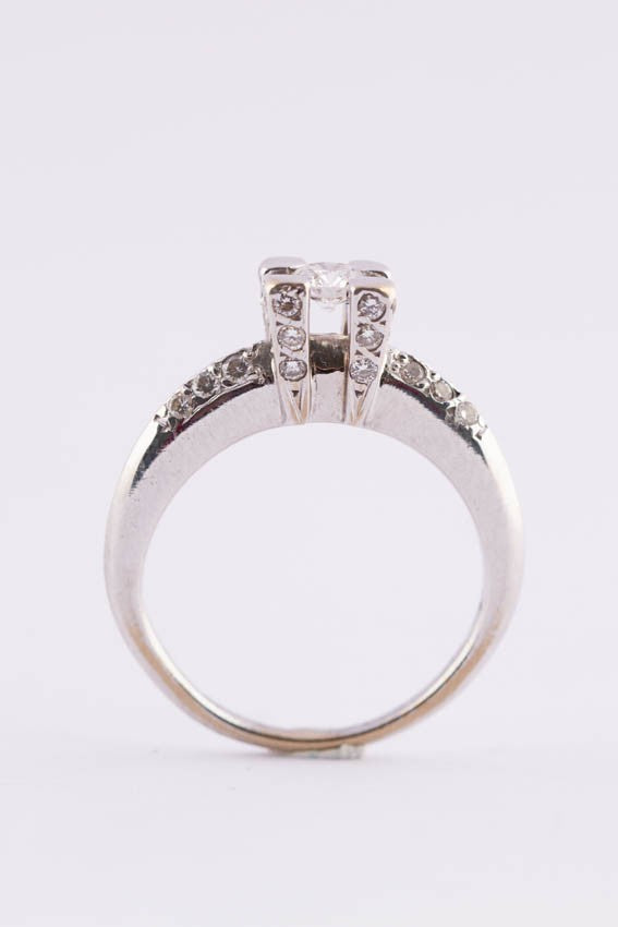 18 carat white gold ring with diamonds