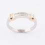 White/yellow gold row ring with princess cut diamonds