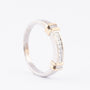 White/yellow gold row ring with princess cut diamonds