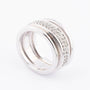 White gold band ring with diamonds together with sliding rings