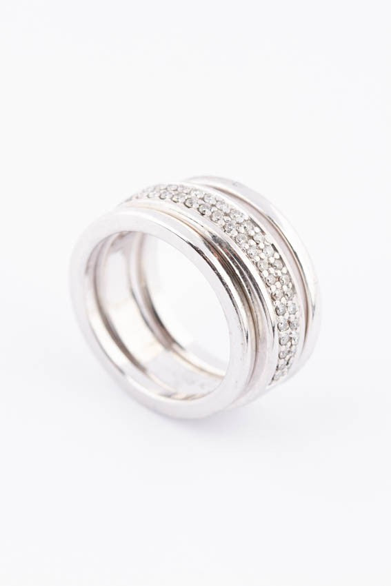 White gold band ring with diamonds together with sliding rings
