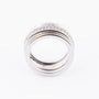 White gold band ring with diamonds together with sliding rings