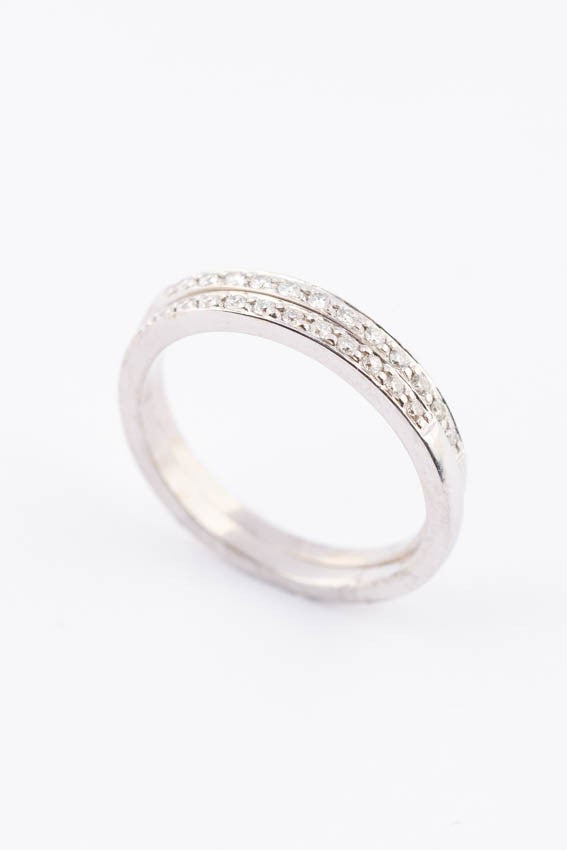 White gold sliding rings with diamonds in each