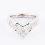 White gold V-ring with princess cut diamonds