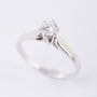 White gold solitaire ring with a 0.35 ct brilliant.