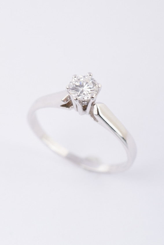 White gold solitaire ring with a 0.35 ct brilliant.
