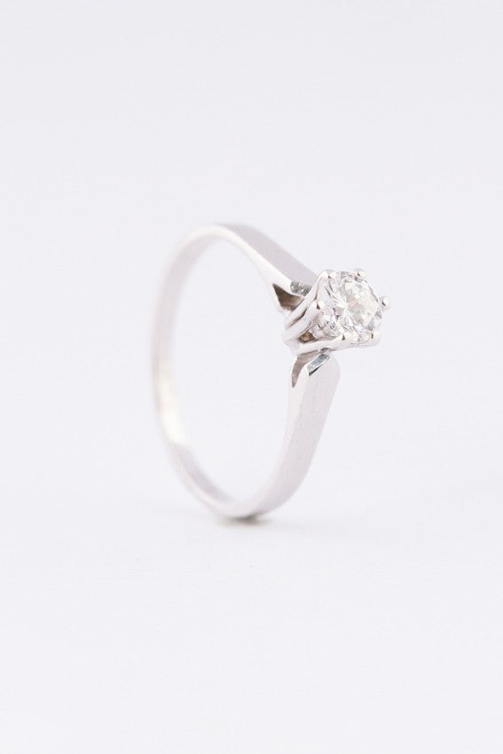 White gold solitaire ring with a 0.35 ct brilliant.
