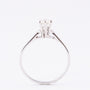 White gold solitaire ring with a 0.35 ct brilliant.