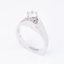 White gold solitaire ring with a 0.43 ct brilliant cut diamond.