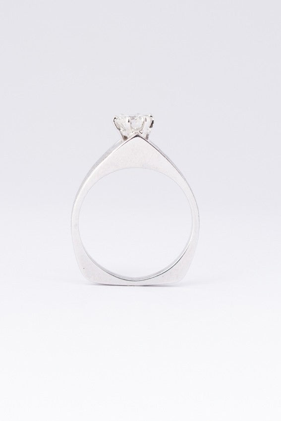 White gold solitaire ring with a 0.43 ct brilliant cut diamond.