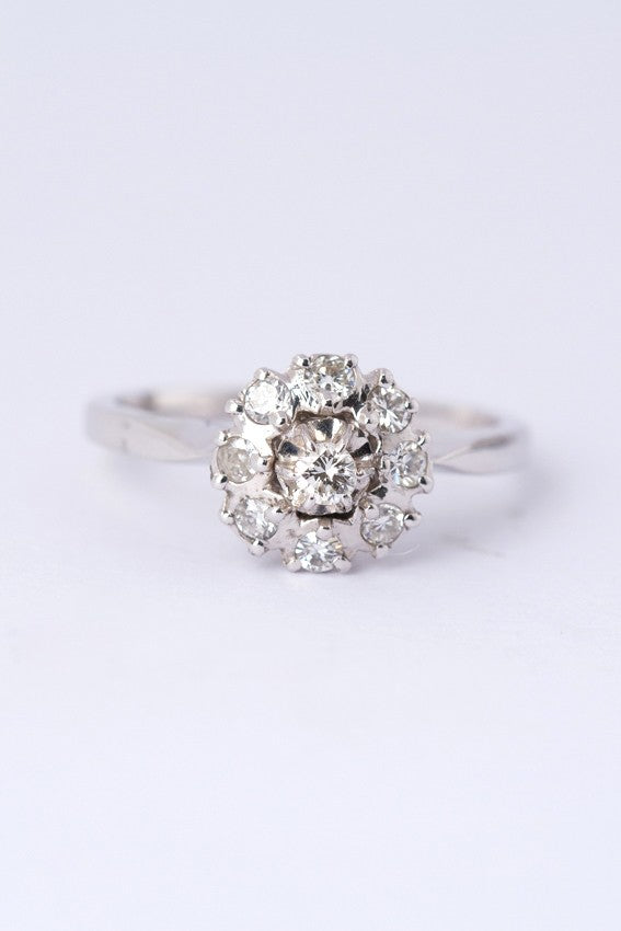 White gold entourage ring with diamonds