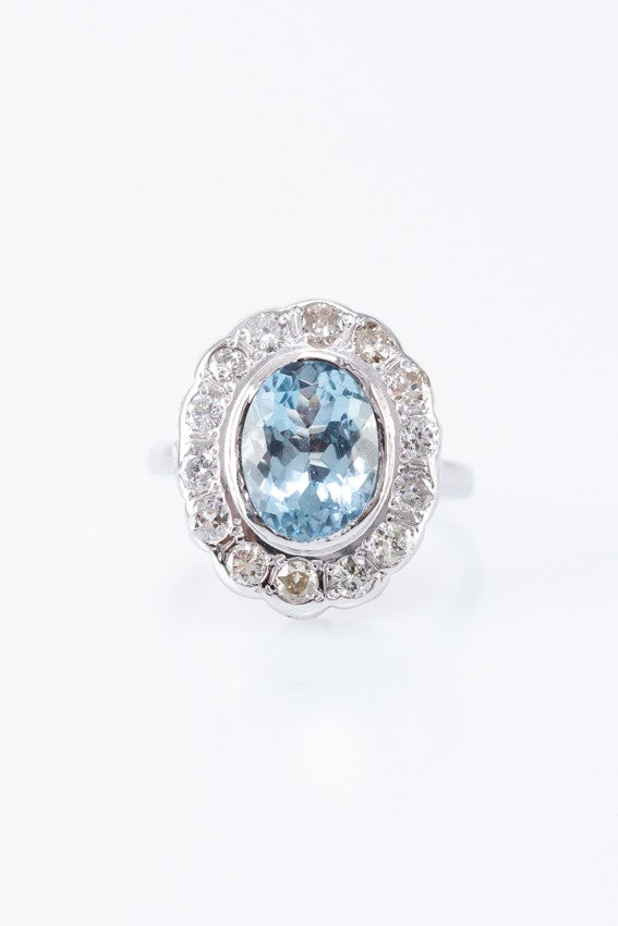 White gold entourage ring with natural aquamarine and diamonds