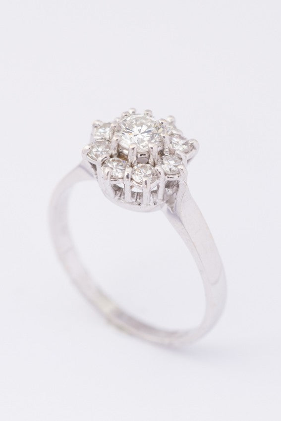 White gold entourage ring with diamonds