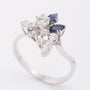 White gold fantasy ring with 2 marquise-cut sapphires and brilliant-cut diamonds
