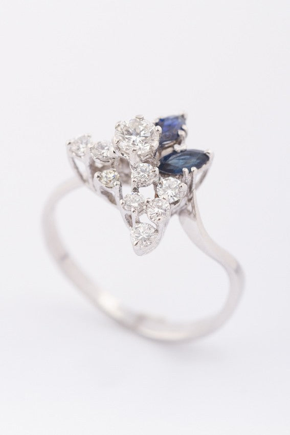 White gold fantasy ring with 2 marquise-cut sapphires and brilliant-cut diamonds