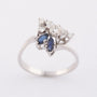 White gold fantasy ring with 2 marquise-cut sapphires and brilliant-cut diamonds