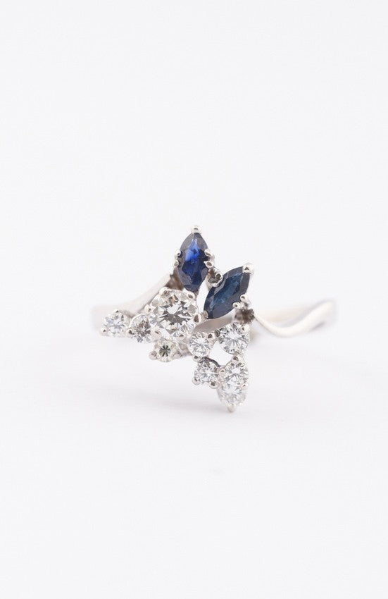 White gold fantasy ring with 2 marquise-cut sapphires and brilliant-cut diamonds