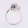 White gold fantasy ring with 2 marquise-cut sapphires and brilliant-cut diamonds