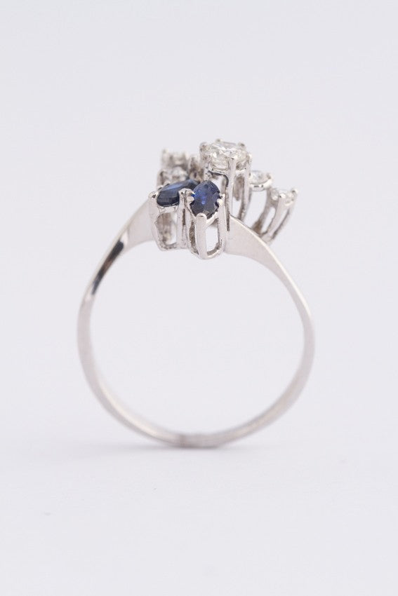 White gold fantasy ring with 2 marquise-cut sapphires and brilliant-cut diamonds