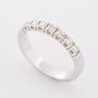 Wit gouden rij ring met 7 briljanten. 0.35 ct.
