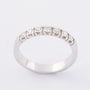 Wit gouden rij ring met 7 briljanten. 0.35 ct.