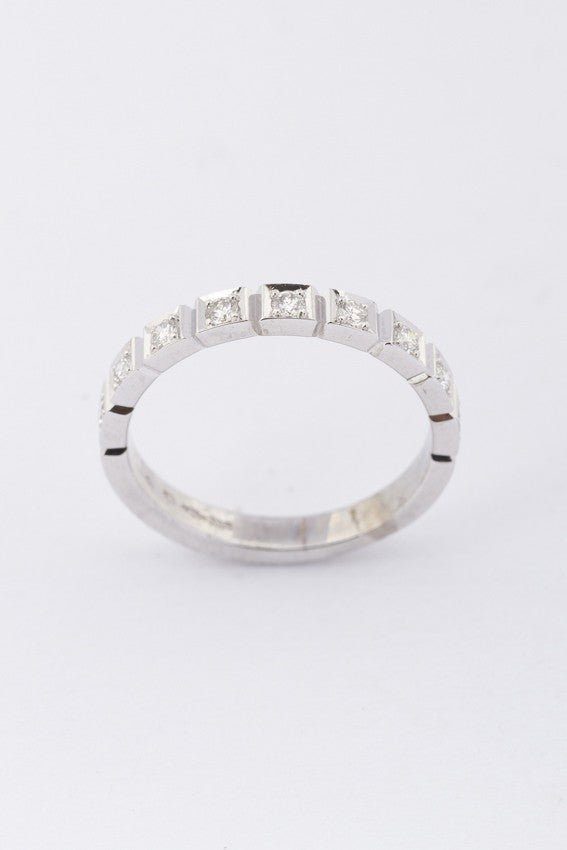 White gold half alliance ring with diamonds