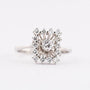 White gold entourage ring with diamonds. Total weight approx. 0.47 ct.