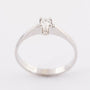 White gold solitaire ring with a 0.14 ct brilliant.
