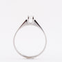 White gold solitaire ring with a 0.14 ct brilliant.