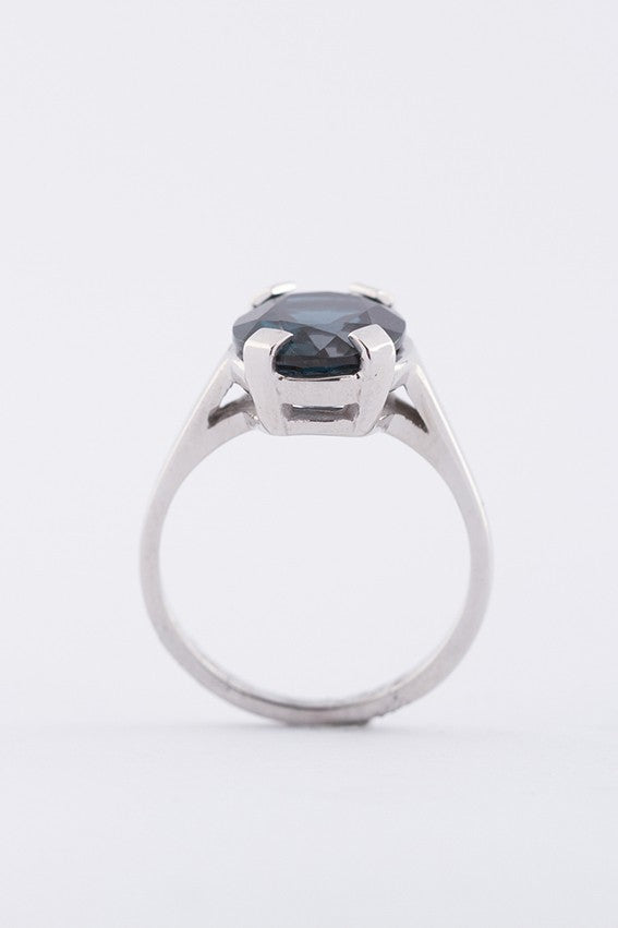White gold ring with a topaz