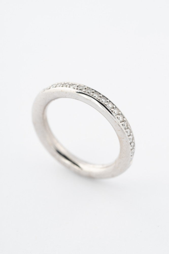 White gold half alliance ring with diamonds