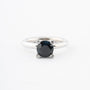 White gold ring with sapphire and 4 diamonds