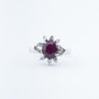 White gold entourage ring with ruby ​​and diamonds