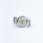 White block ring with a peridot and diamonds