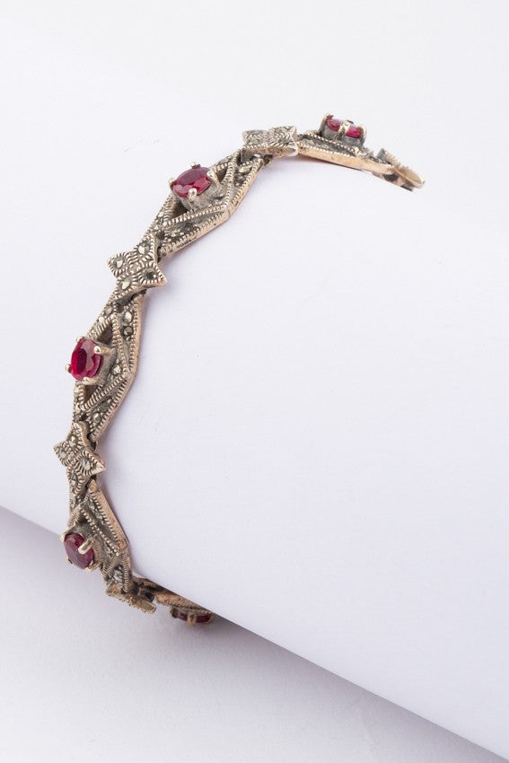 Zilveren demi-parure met robijnen en markasiet