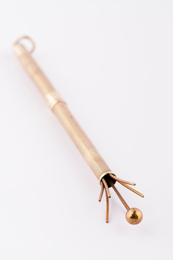 Golden champagne knocker