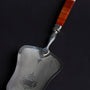Antique silver fish scoop with carnelian handle