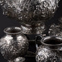 Silver tableware with old Dutch scene