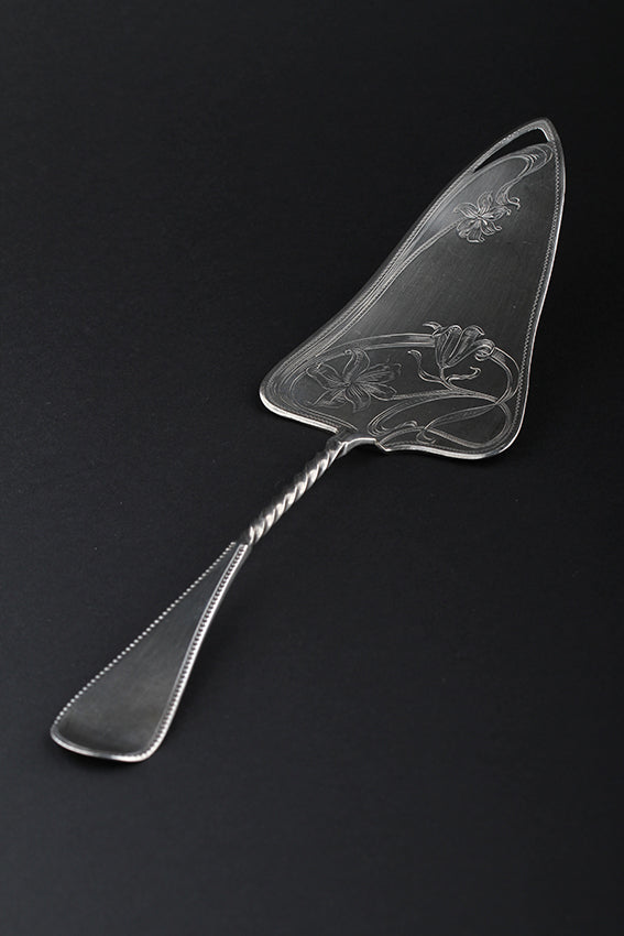 Antique silver cake server