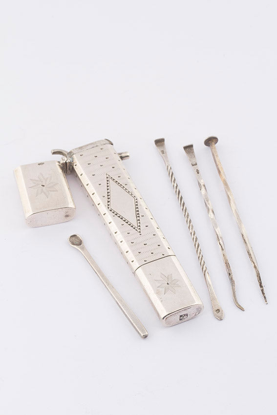 Antique silver pipe set