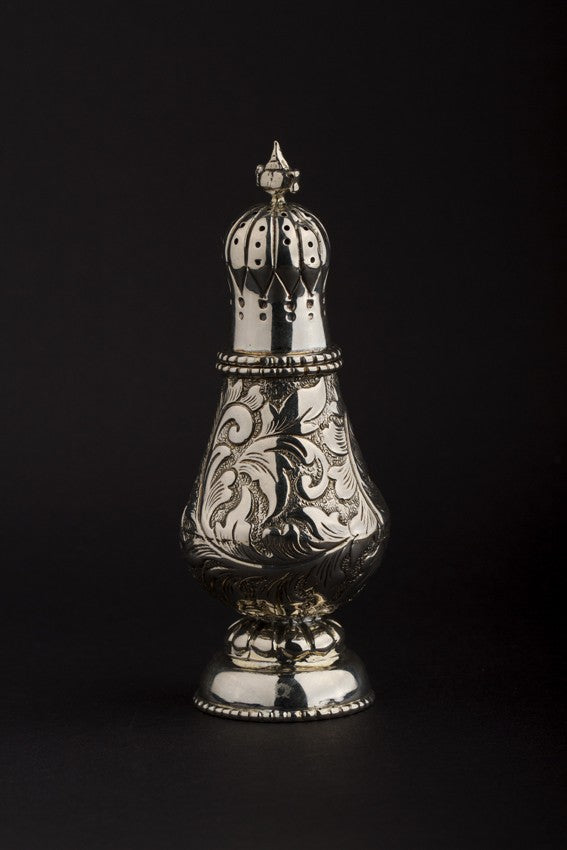 Antique silver spice shaker