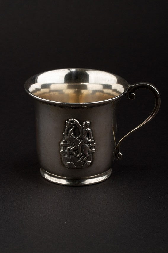 Old silver children's cup with goat