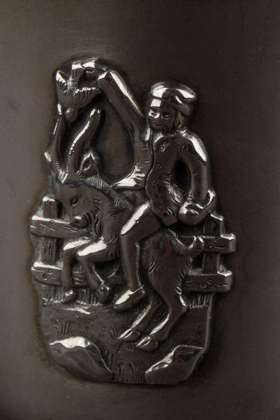 Old silver children's cup with goat