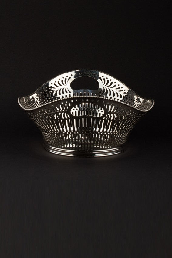 Old silver openwork bread basket