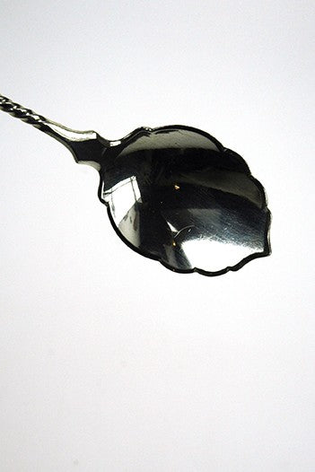 Antique silver ginger spoon