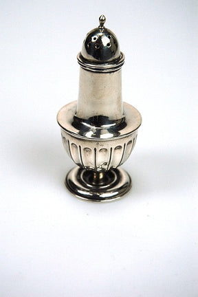 Old silver spice shaker