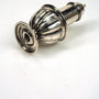Old silver spice shaker