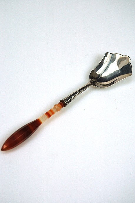 Antique silver sugar scoop
